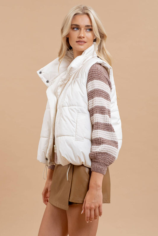 IVORY ASYMMETRICAL ZIP UP HIGH NECK PUFFER VEST