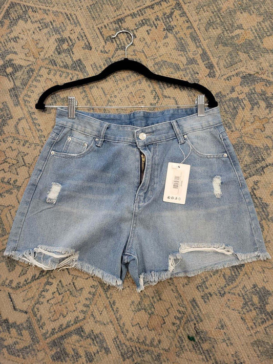 High-waisted denim shorts with frayed edges